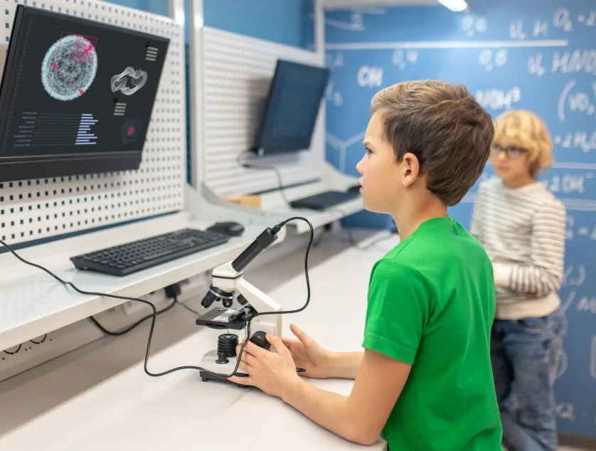 boy-sideways-camera-looking-intently-charging-board