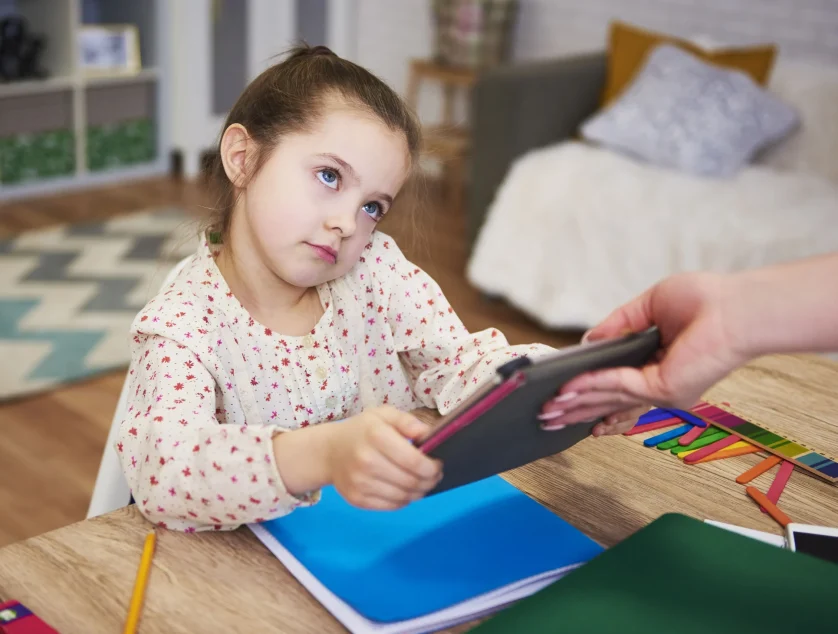 parent-taking-away-tablet-from-child